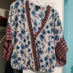 Floral V-Neck Blouse with Red and Blue Accents